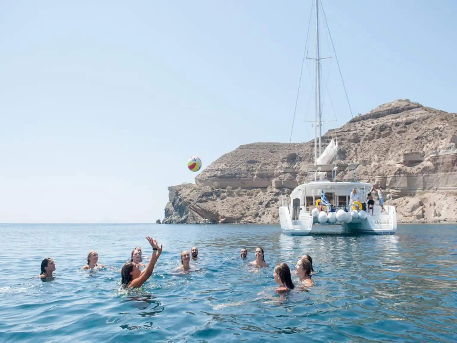Caldera Classic Catamaran Tour with Meal:Black Mountain,Red & White Beaches,Hot Springs- Small group
