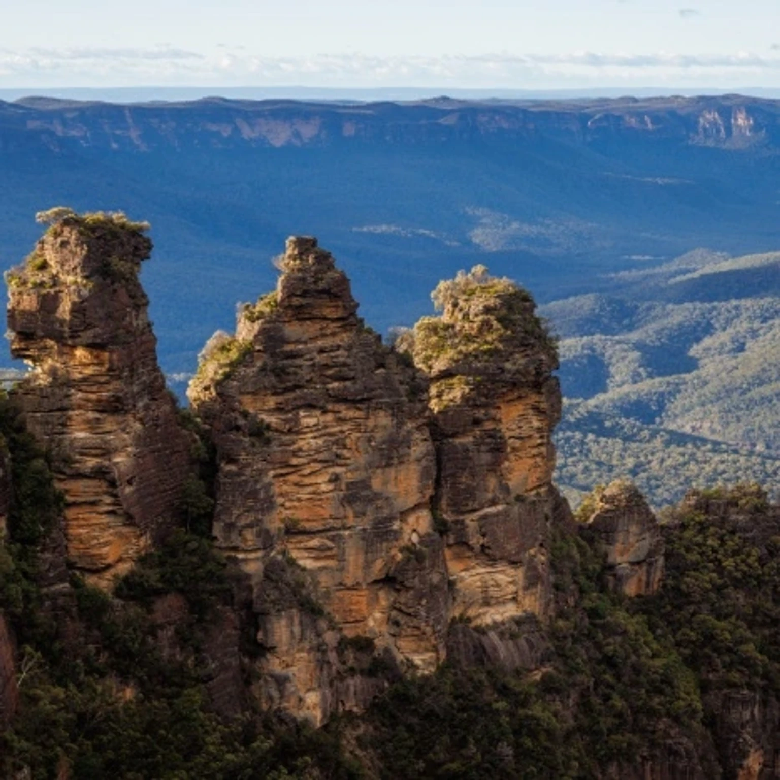 Holiday packages showcasing beautiful Australian landscapes and attractions.