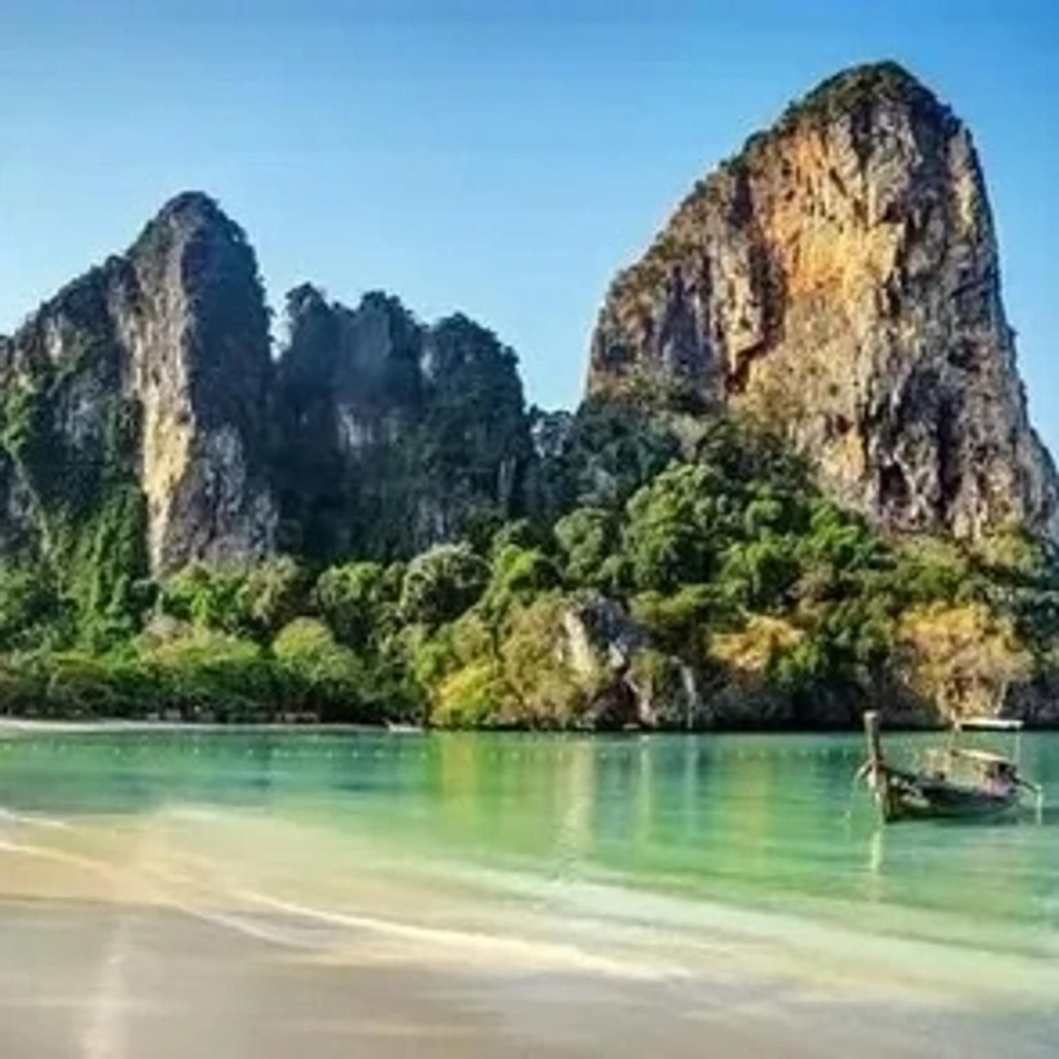Tropical beach holiday package featuring vibrant scenery and relaxation in Thailand.