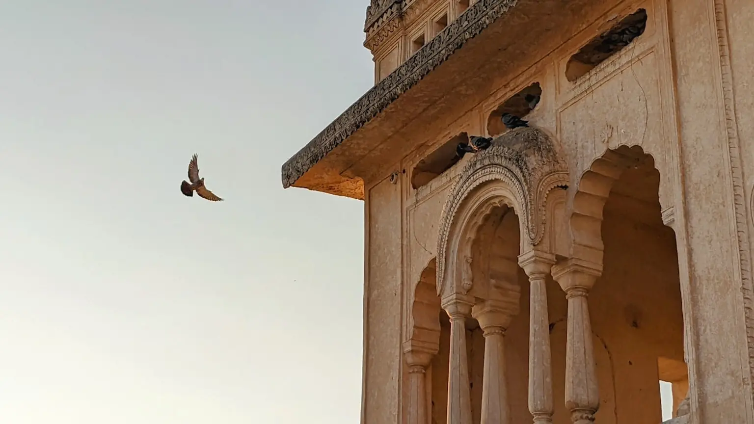 A picturesque landscape featuring ancient ruins and historical architecture, reflecting rich cultural heritage and timeless exploration.