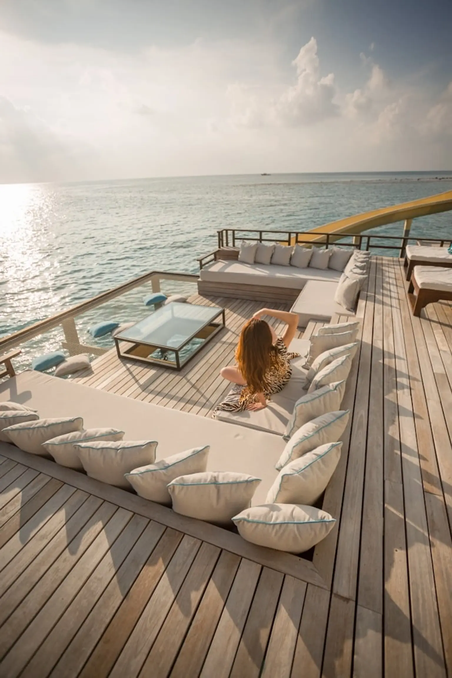 Elegant resort poolside with luxurious amenities and stunning views.